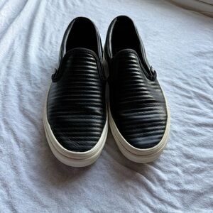 Vans Black Quilted Slip-On Sneakers with White Sole